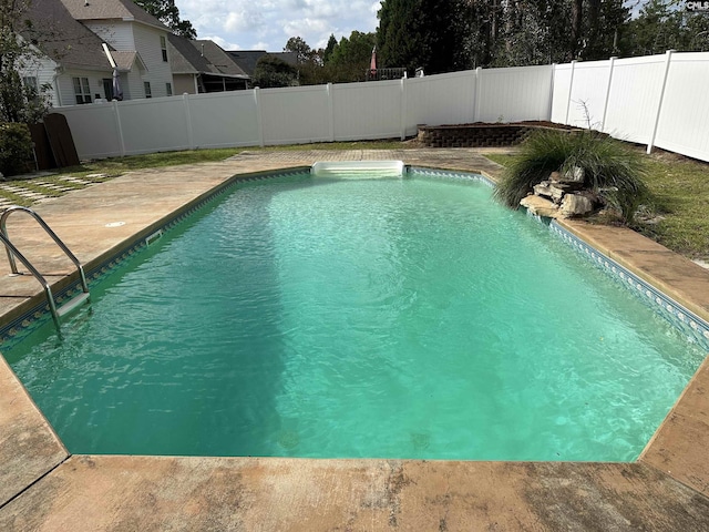 view of pool featuring a fenced backyard