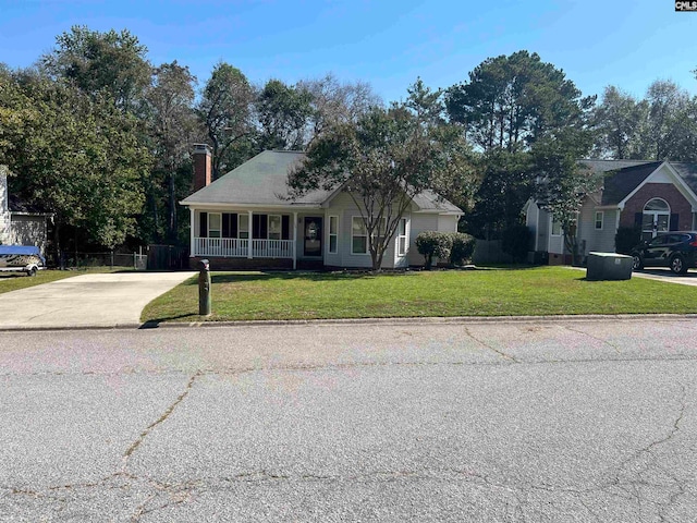 view of front of house featuring a front yard and a porch