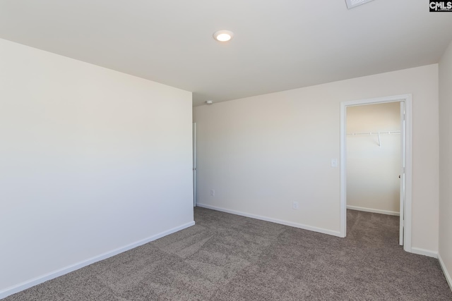 unfurnished room featuring carpet floors