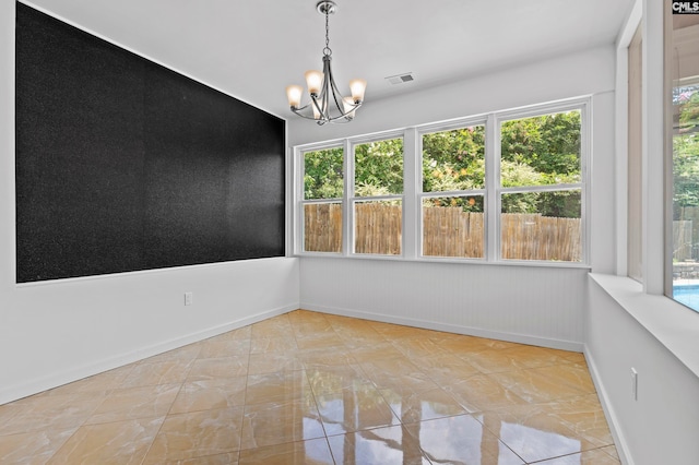 interior space featuring a chandelier