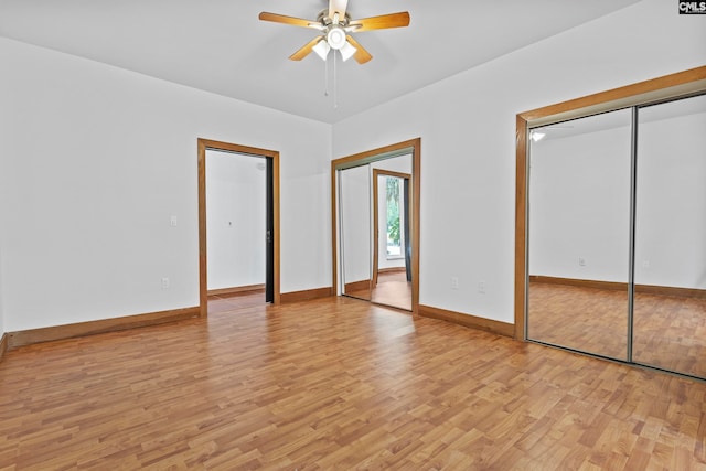 unfurnished bedroom featuring ceiling fan and light hardwood / wood-style flooring