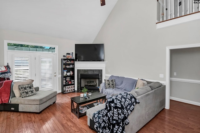 living room featuring high vaulted ceiling, ceiling fan, and hardwood / wood-style floors