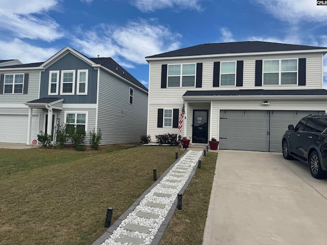 view of front of home featuring a garage and a front lawn