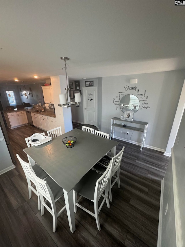 dining room featuring dark hardwood / wood-style flooring