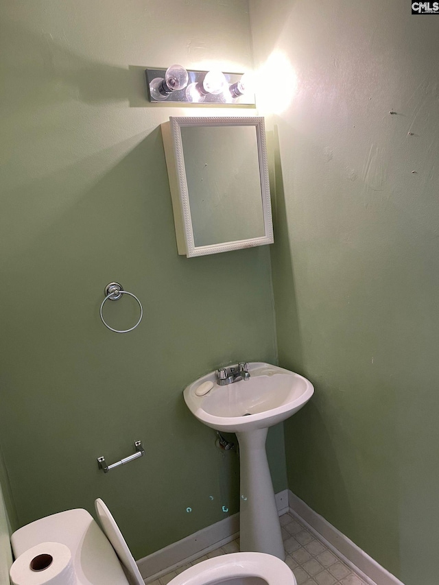 bathroom featuring toilet