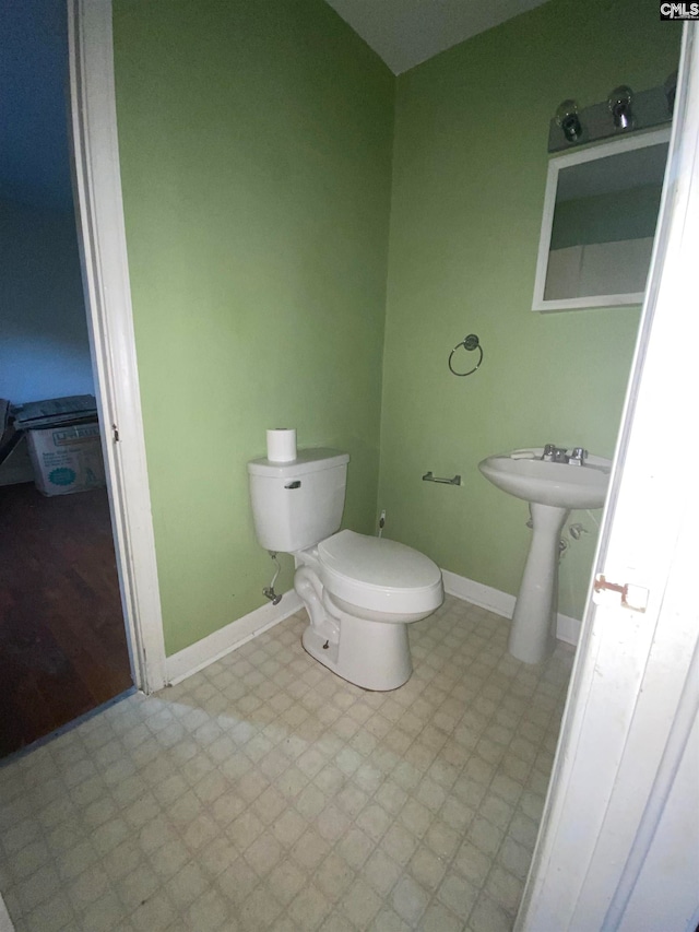 bathroom with sink and toilet