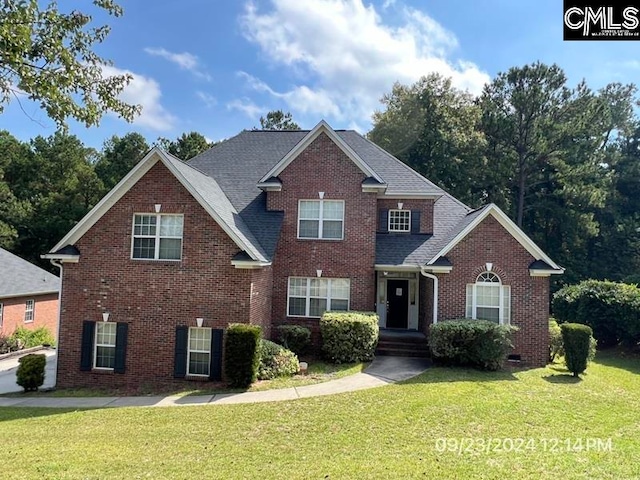 front of property featuring a front lawn