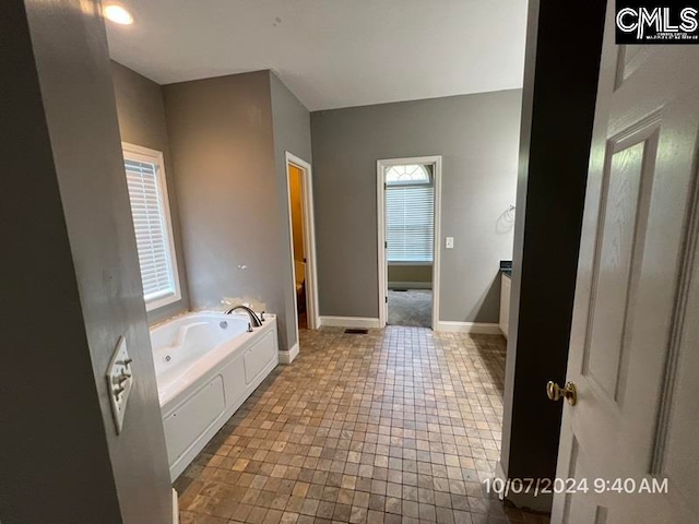 bathroom with a washtub