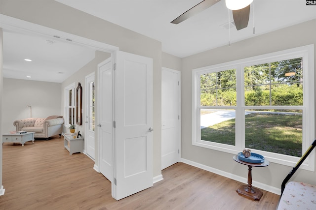 bedroom featuring light hardwood / wood-style floors and ceiling fan