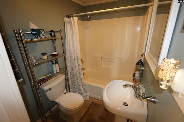 full bathroom featuring shower / tub combo, sink, and toilet