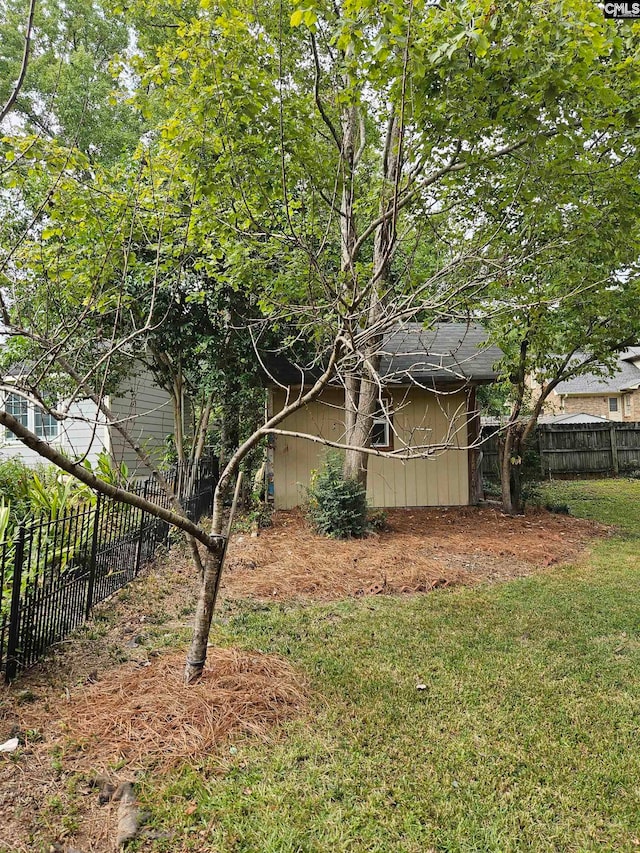 view of home's exterior featuring a lawn