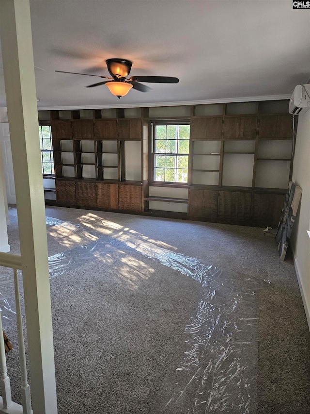 interior space featuring ceiling fan, carpet flooring, and a wall unit AC