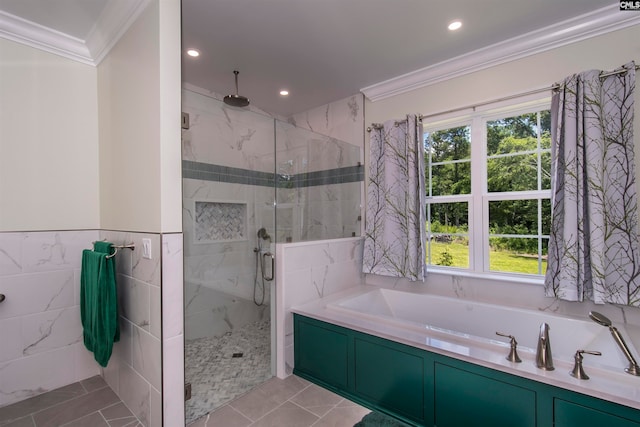 bathroom featuring ornamental molding, tile patterned flooring, tile walls, and shower with separate bathtub