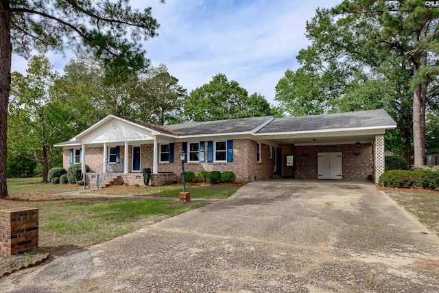 view of front of property with a carport