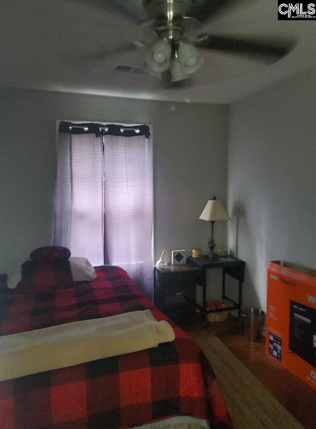 1518 Woodlawn Dr, Camden, SC 29020 - bedroom with visible vents, ceiling fan, and wood finished floors