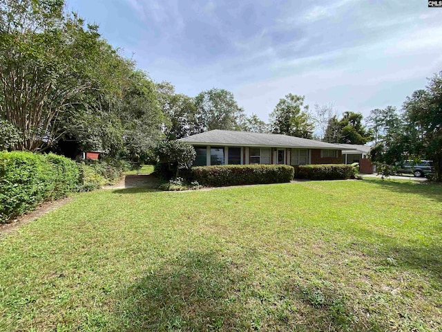 exterior space with a front yard