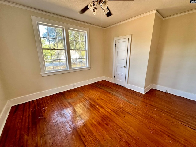 unfurnished room featuring crown molding, ceiling fan, hardwood / wood-style floors, and a textured ceiling