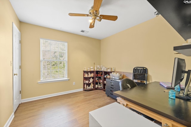 office area with wood-type flooring and ceiling fan