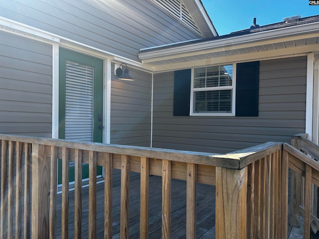 view of side of property featuring a deck