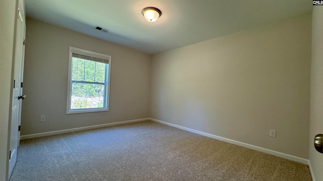 view of carpeted spare room