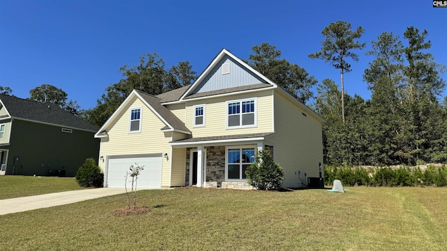 view of front of home featuring a garage, a front yard, and central air condition unit