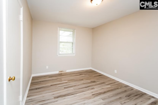 empty room featuring light hardwood / wood-style floors