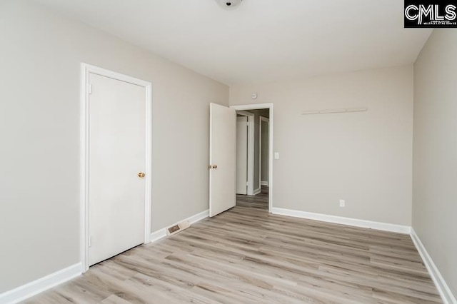 empty room featuring light hardwood / wood-style flooring