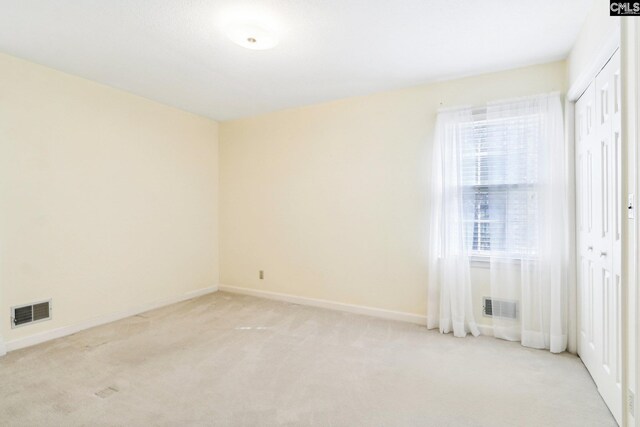 886 Polson Rd, Camden, SC 29020 - empty room featuring visible vents, baseboards, and light carpet