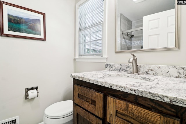 886 Polson Rd, Camden, SC 29020 - bathroom with visible vents, a stall shower, toilet, and vanity