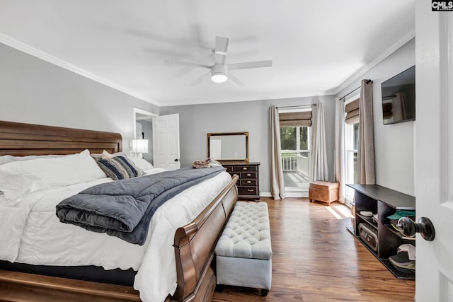 bedroom featuring ceiling fan, ornamental molding, and dark hardwood / wood-style flooring