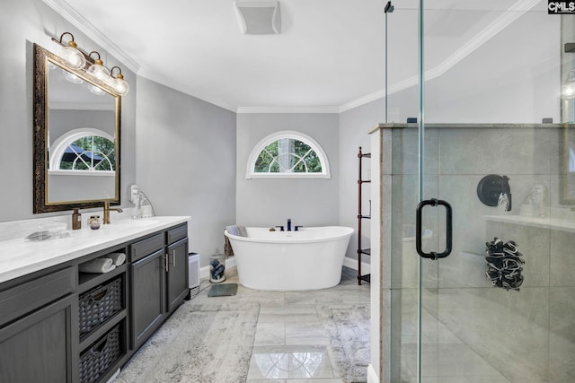 bathroom with ornamental molding, vanity, and independent shower and bath