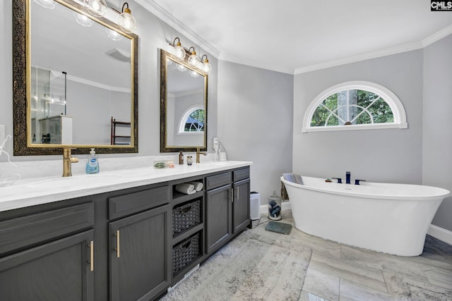 bathroom featuring vanity, crown molding, and a bath