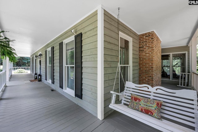 wooden deck with covered porch