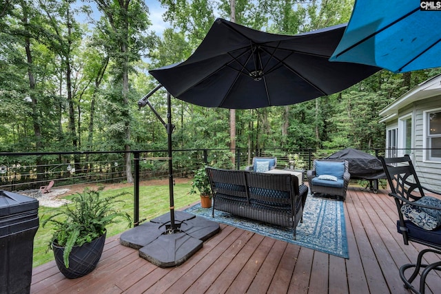 wooden deck with outdoor lounge area