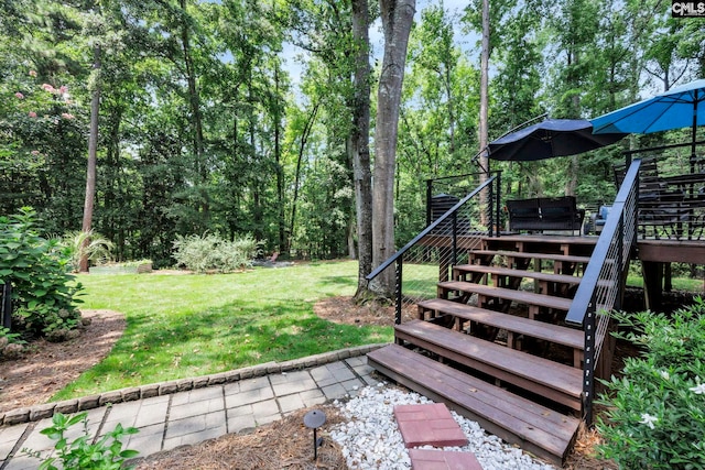 view of yard featuring a deck