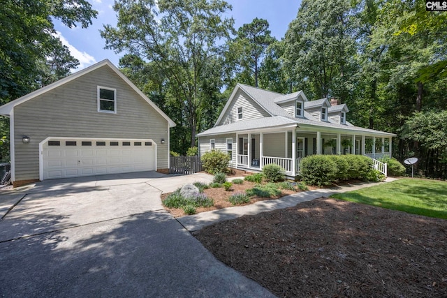 view of front facade featuring a garage and a porch