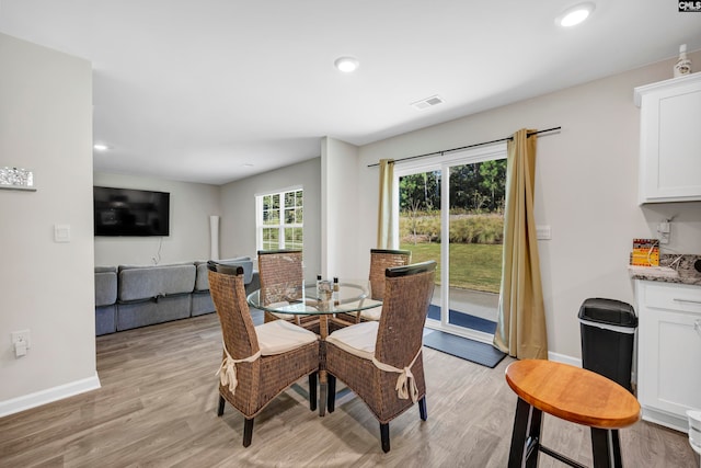 dining area featuring light hardwood / wood-style floors