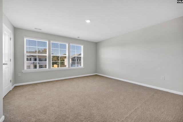 unfurnished room with carpet