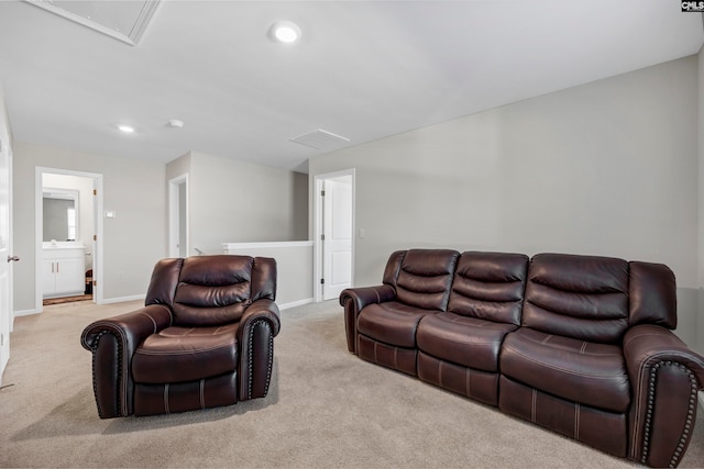 living room featuring light carpet