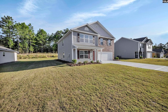 view of front of property featuring a garage and a front yard