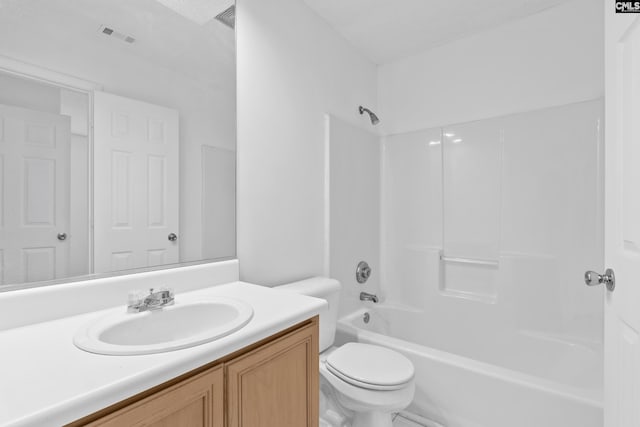 full bathroom with vanity, washtub / shower combination, and toilet