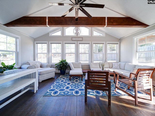 sunroom / solarium featuring lofted ceiling with beams, a healthy amount of sunlight, and ceiling fan