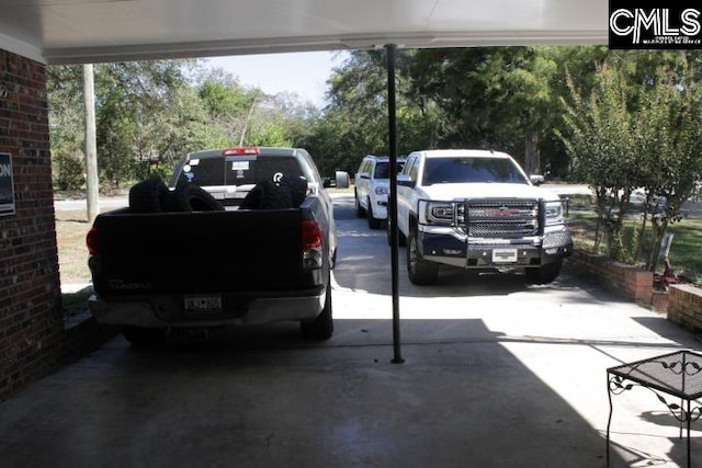 view of car parking with a carport