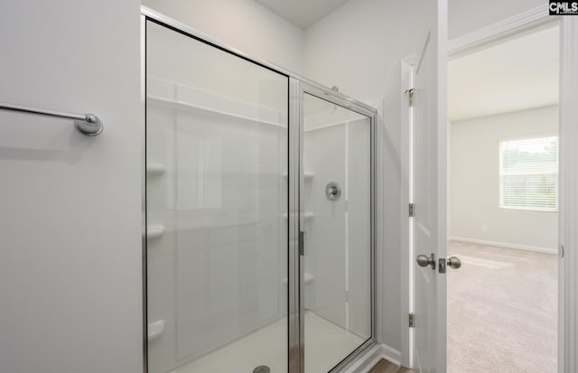 bathroom featuring walk in shower