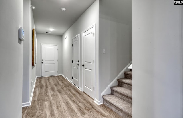 hallway featuring light hardwood / wood-style floors