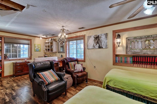 bedroom featuring crown molding, dark hardwood / wood-style flooring, multiple windows, and a textured ceiling