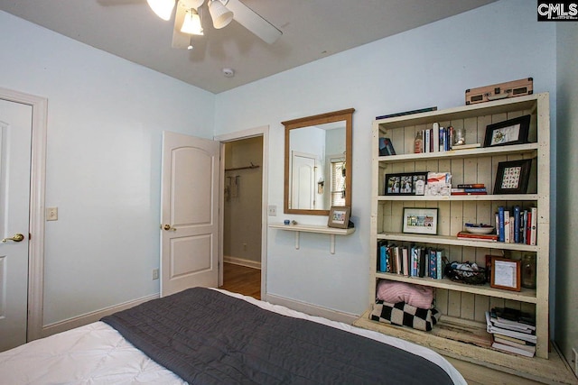 bedroom featuring ceiling fan and hardwood / wood-style floors