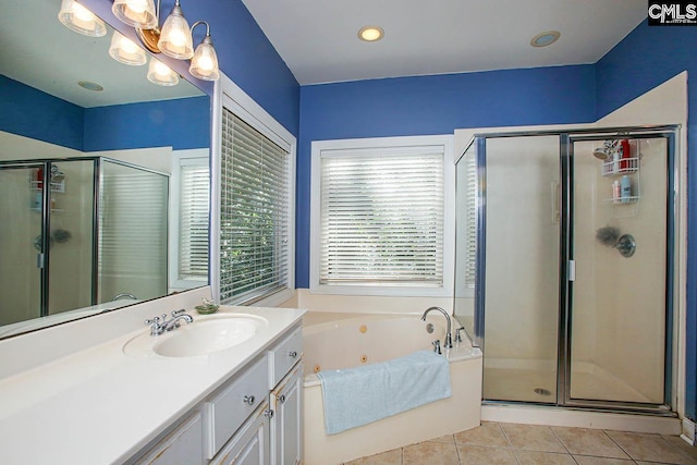 bathroom featuring tile patterned floors, vanity, and independent shower and bath