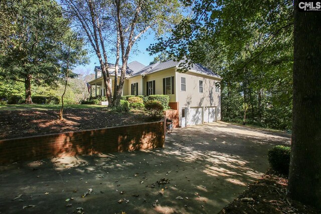 view of home's exterior featuring a garage