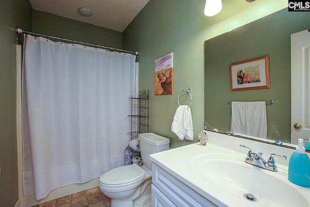 bathroom with vanity, toilet, and a shower with shower curtain